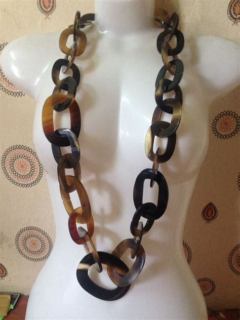 buffalo horn charm necklace.